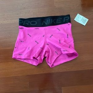 Nike Pro Spandex. Never worn. Tag still on. XS. Pink.